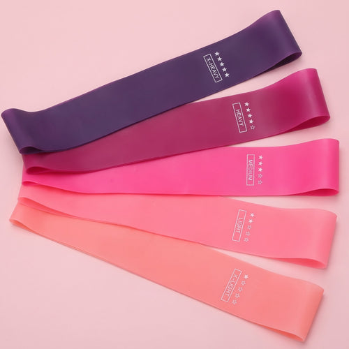 Blush & Burn Booty Band Set: five flat resistance loop bands from X-Light to X-Heavy fanned on blush pink